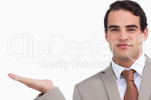Close up of salesman holding palm up