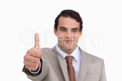 Close up of thumb up being given by salesman