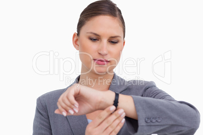 Businesswoman checking her watch