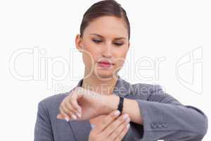 Businesswoman checking her watch