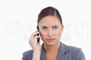 Close up of tradeswoman listening to caller