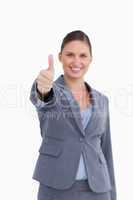 Thumb up given by smiling saleswoman