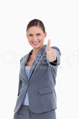 Smiling saleswoman giving her approval