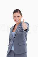 Smiling saleswoman giving her approval