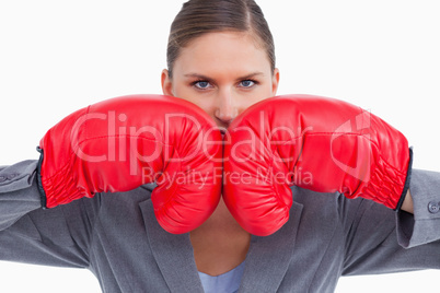 Aggressive tradeswoman with boxing gloves