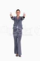 Smiling tradeswoman giving thumbs up
