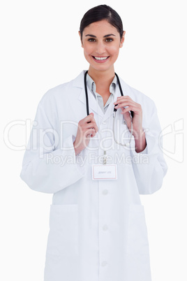 Smiling female doctor with stethoscope around her neck