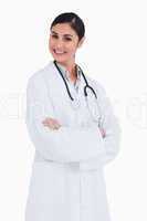 Smiling female doctor with her arms folded