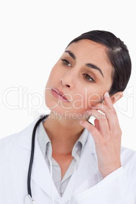 Close up of thoughtful female doctor