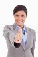 Close up of thumb up being given by female entrepreneur