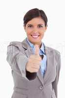 Close up of female entrepreneur giving thumb up