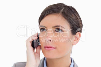 Close up of female entrepreneur with her cellphone