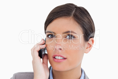 Close up of female entrepreneur talking on her cellphone
