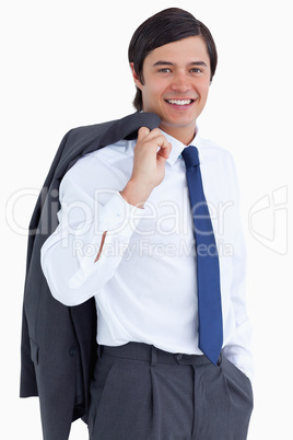 Smiling young tradesman with jacket over his shoulder