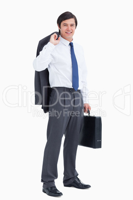 Smiling tradesman with jacket and suitcase