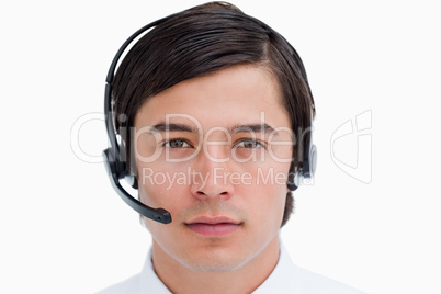 Close up of male call center agent with headset on