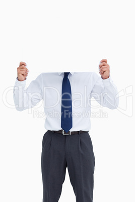 Tradesman holding blank sign in front of his head