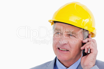 Close up of mature architect on the phone