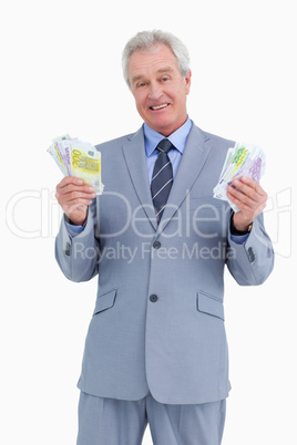 Mature businessman presenting his earnings