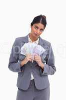 Female entrepreneur holding bank notes