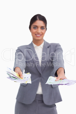 Female entrepreneur handing over money