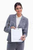 Smiling female entrepreneur asking for signature