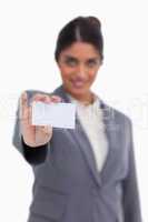 Blank business card being held by female entrepreneur