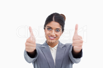 Female entrepreneur giving thumbs up