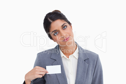 Female entrepreneur pointing at name sign