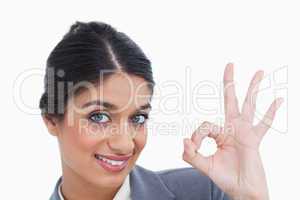 Close up of smiling female entrepreneur giving her approval
