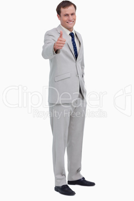 Smiling businessman giving his approval