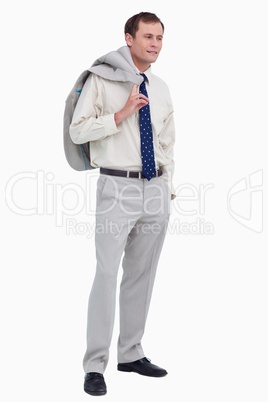 Side view of businessman with jacket over his shoulder