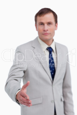 Hand of businessman being offered