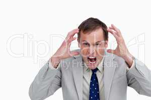 Close up of furious yelling businessman