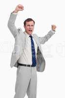 Celebrating businessman with his arms up
