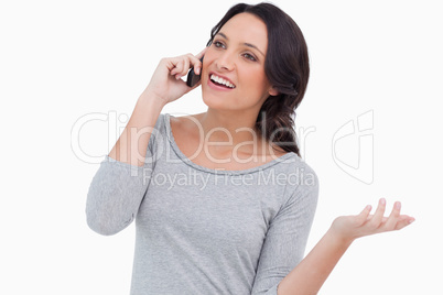 Close up of smiling woman talking on her mobile phone