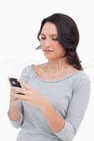 Close up of woman reading text message