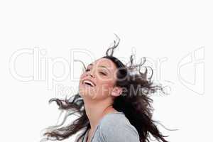Smiling woman flipping her hair