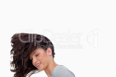 Young woman flipping her hair