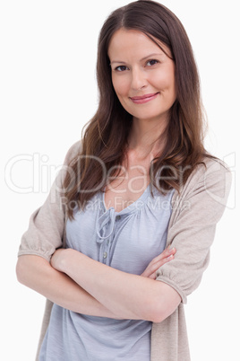 Close up of smiling woman with her arms folded