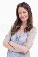 Close up of smiling woman with her arms crossed