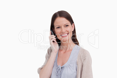 Smiling woman on her cellphone