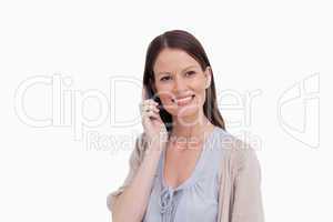 Smiling woman on her cellphone