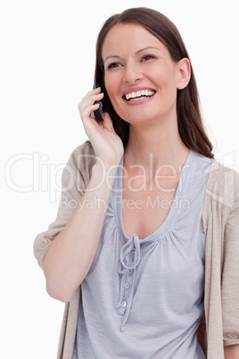 Close up of laughing woman on her cellphone