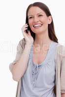 Close up of laughing woman on her cellphone