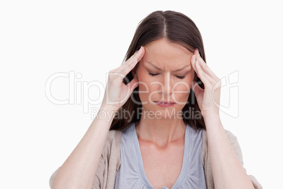 Close up of woman experiencing a headache