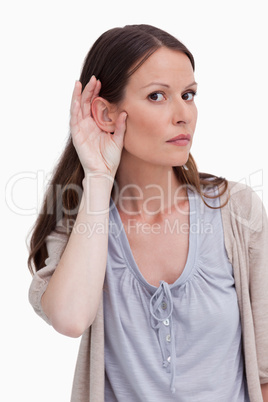Close up of woman listening closely