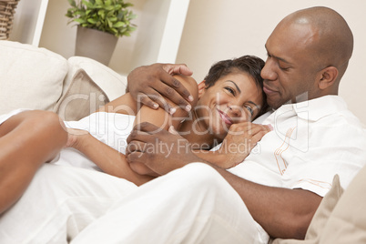 Happy African American Man & Woman Couple Embracing