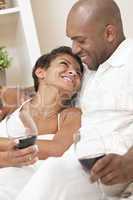 Happy African American Man & Woman Couple Drinking Wine