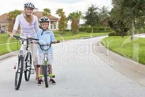 Woman and Boy Child, Mother & Son Cycling